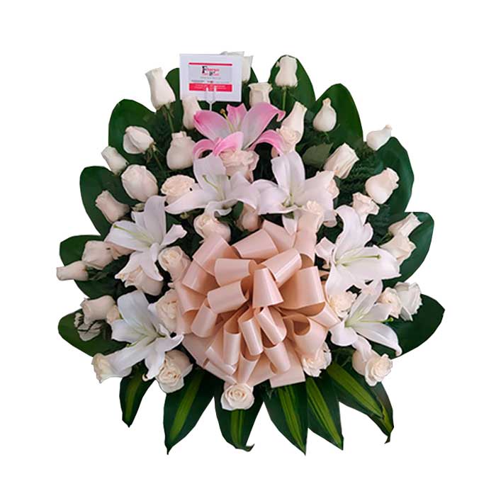 Funebre-con-lirios-y-rosas-Floristeria-en-cali