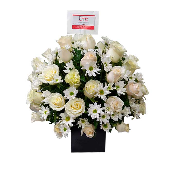 arreglo floral funerario en Cali