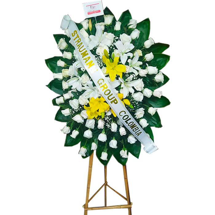 arreglo floral funerario en Cali