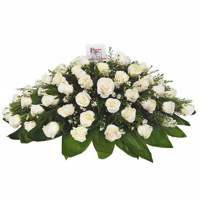 arreglo floral funerario en Cali