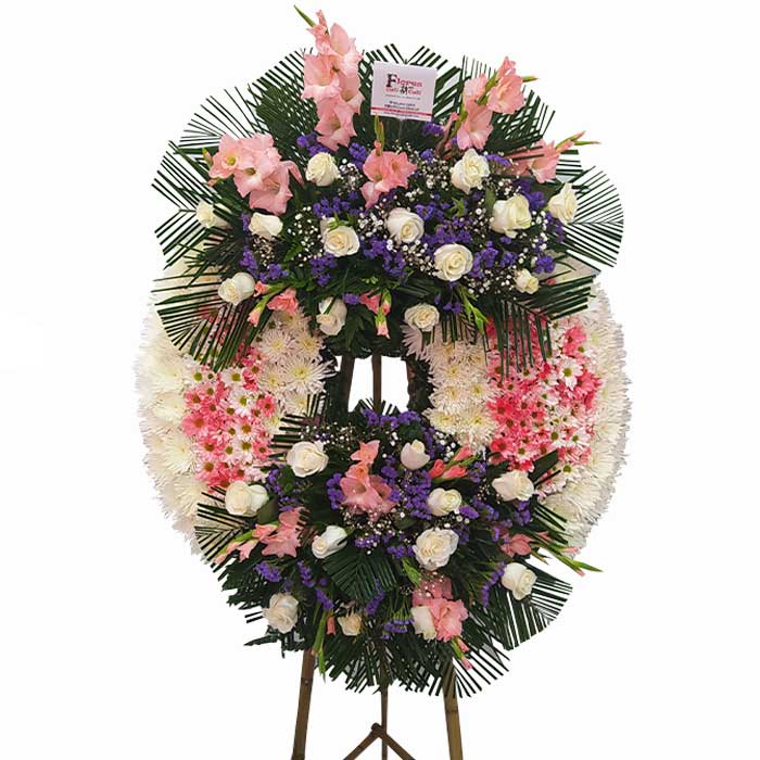 arreglo floral funerario en Cali