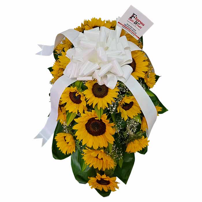 arreglo floral funerario en Cali